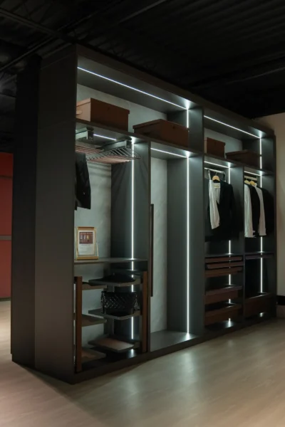 Luxury wardrobe with illuminated shelving and integrated storage system